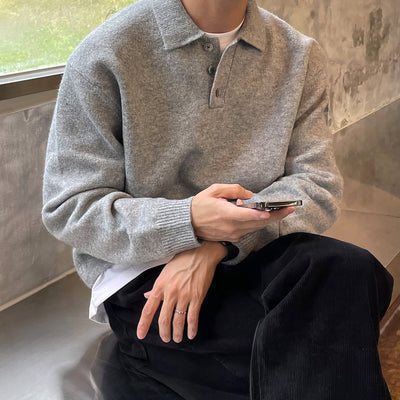 Man wearing LuxeHaven men’s long-sleeve polo collar knit sweater.