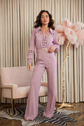 Woman wearing LuxeHaven crochet detailed woven top fashion jumpsuit with belted waist and elegant tailored fit