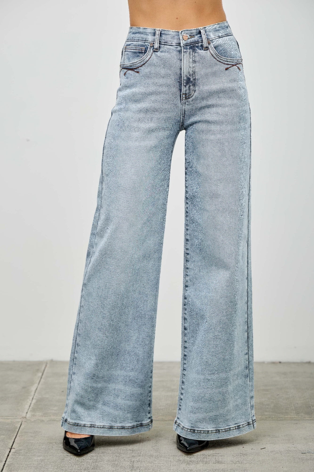 LuxeHaven™ high-rise wide-leg jeans with stretch denim fabric, relaxed silhouette, and classic five-pocket styling.
