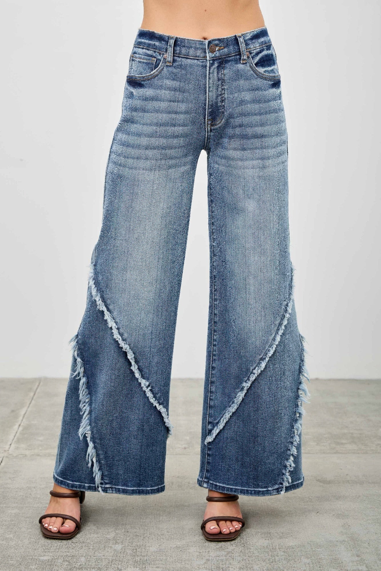LuxeHaven™ mid-rise wide-leg jeans with frayed seam detailing, stretch denim fabric, and relaxed modern fit