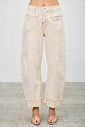 Woman wearing LuxeHaven high-rise colored western barrel pants with a modern barrel-leg silhouette.