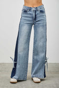 Woman wearing LuxeHaven™ high rise contrast wide leg denim jeans with ribbon tie detail