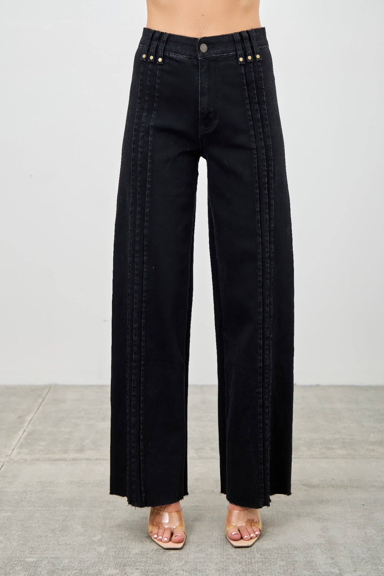 Women’s high-rise straight-leg jeans with front pleat detailing, stretch denim fabric, and polished everyday styling.