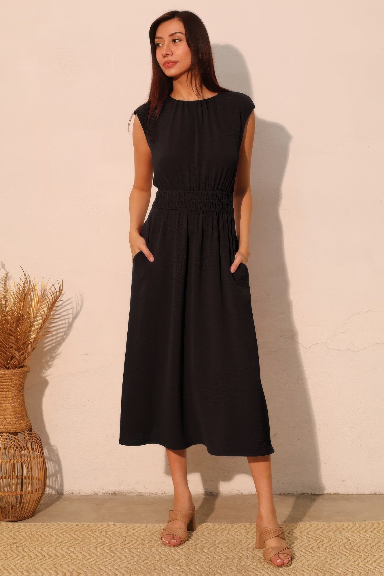 Women’s matte crepe midi dress with ruched elastic waist, elegant silhouette, and functional pockets.