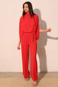 LuxeHaven™ Textured Solid Mock Neck Caftan Jumpsuit featuring a relaxed fit, textured fabric, elegant mock neckline, and flowing wide-leg silhouette