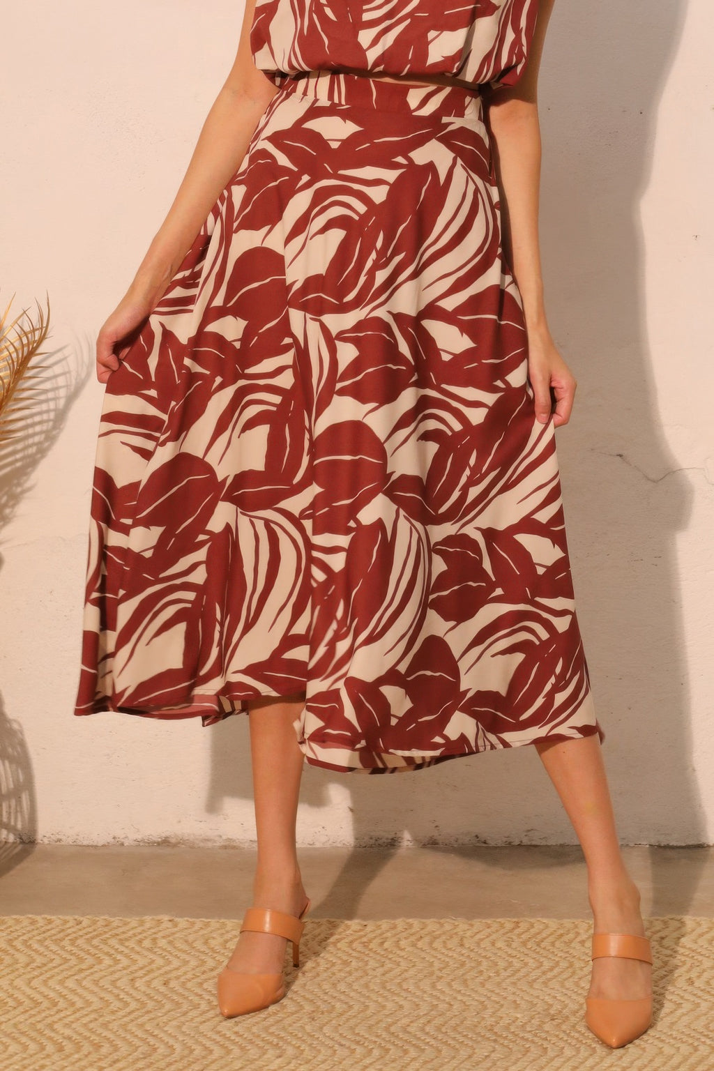Lucca Leaf midi swing skirt with tropical print and flowing lightweight silhouette