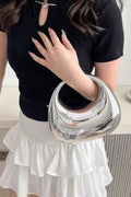 LuxeHaven™ metallic acrylic clutch bag with glossy structured design