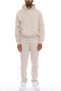 Man wearing LuxeHaven premium cotton blend hoodie set with matching pants, comfortable two-piece casual tracksuit.