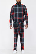 Man wearing LuxeHaven plaid checkered full zip track pants with athletic fit and full-length side zippers.